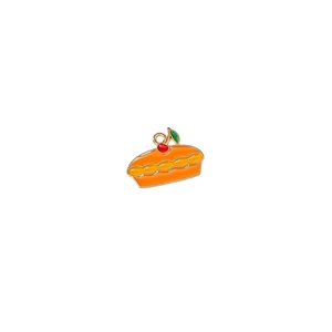 Detailed view of handmade pumpkin pie enamel pendant with golden trim for DIY jewelry