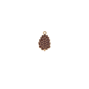Detailed macro shot of a brown enamel pinecone pendant with gold metallic trim