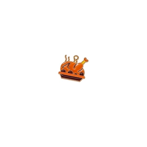 Detail of enamel turkey charm pendant in orange and gold for DIY Thanksgiving jewelry