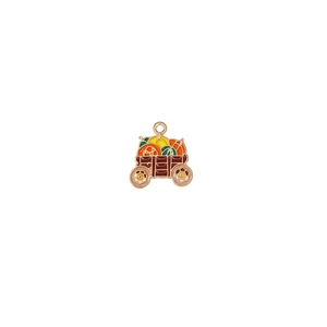 Detailed enamel pumpkin carriage pendant with gold trim for DIY festive jewelry making