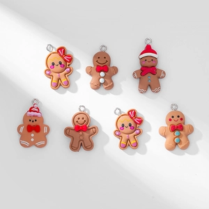 Set of 7 cute resin gingerbread man charms with silver metal rings for DIY jewelry