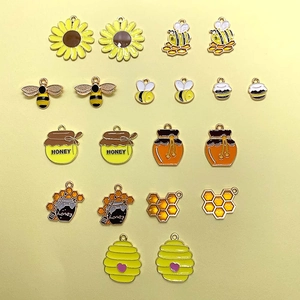 Dijes DIY de abeja y girasol en esmalte metálico amarillo y marrón para joyas