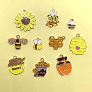 Set de 10 colgantes esmaltados de abeja con girasol y miel para joyería artesanal