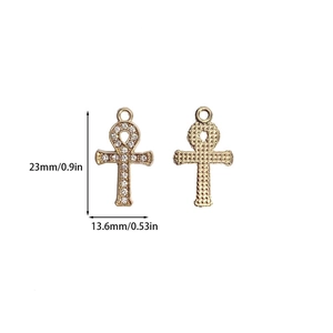Detailed size view of gold Ankh cross pendant with zircons showing 23mm length