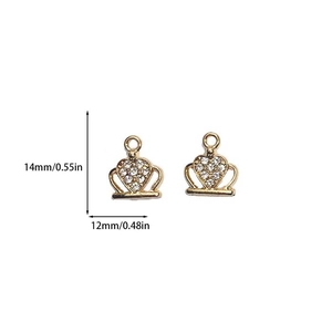 Detail of gold alloy heart crown pendant with zircon pavé, sized 14mm by 12mm