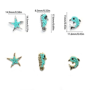 Marine themed starfish, seahorse, and dolphin charms with teal beads in gold and silver