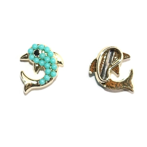 Golden dolphin charm earrings featuring blue turquoise beads and black stone eyes
