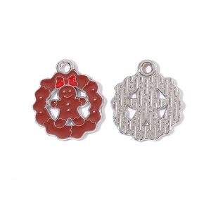 Front and back detail of gingerbread man Christmas wreath alloy pendant charm