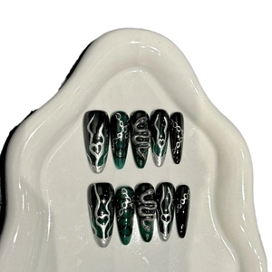 Handmade press-on nails with dark green gradient, silver heart and 3D metal snake design
