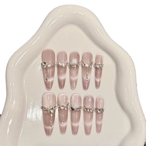 Pink cat eye handmade press-on nails with 3D pearls, white roses and crystal charms