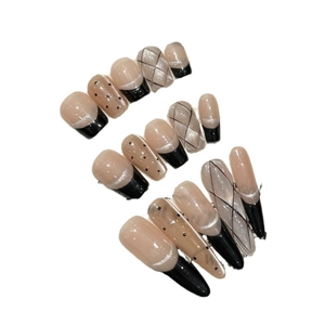 Handmade press-on nail set featuring French black tips, diamond patterns and silver cat eye