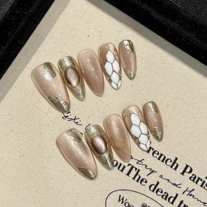 Faux Ongles à Presser Œil de Chat Champagne Faits à la Main Forme Amande Longue Avec Strass et Motif de Serpent Luxe pour Femmes