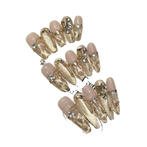 Luxurious champagne gold cat eye press-on nails with rhinestones and pearls