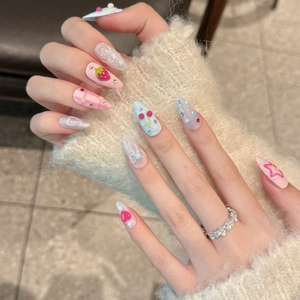 Handmade fruit soda press-on nails with strawberry, cherry, and 3D bow designs