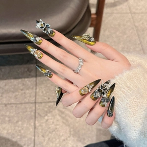 Handmade black gold gothic press-on nails with 3D roses and amber gemstones
