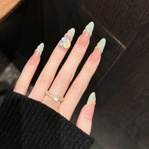 Faux ongles stiletto longs Rainbow Macchiato avec fleurs 3D et dégradé effet marbré