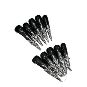 Handmade gothic press-on nails with silver metallic bone textures on black gloss finish