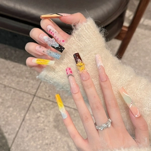 Handmade ice-carved lotus press-on nails with 3D floral art and colorful pearls