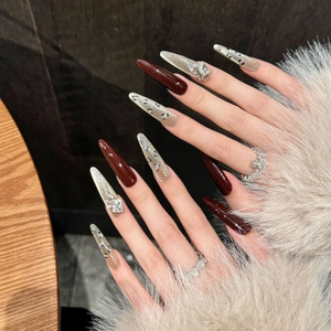 Handmade leopard print and burgundy cat-eye press-on nails with luxury rhinestones