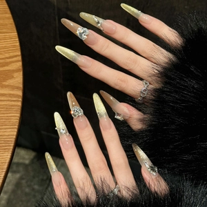 Champagne cat-eye press-on nails with 3D heart rhinestones and pearls in almond shape