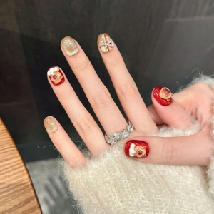 Faux ongles Capybara pailletés rouges et œil de chat doré avec ours 3D et nœud déco