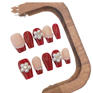 Romantic retro red pearl flower press-on nails in medium coffin shape with rhinestones