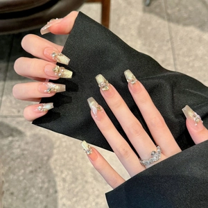 Handmade coffin press-on nails with luxury gold cat-eye effect and pearl butterfly
