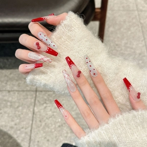 Handmade burgundy bow press-on nails with polka dots and french glitter on long coffin shape