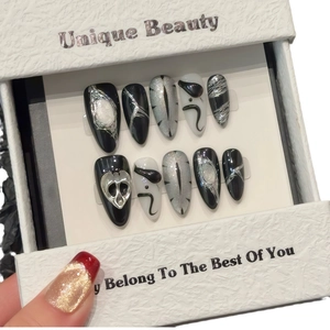 Gothic style almond fake nails with silver cat-eye effect and 3D scream mask decor