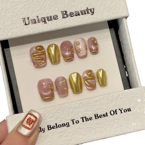 Pink cat eye press-on nails set with gold 3D snake design and pearl accents