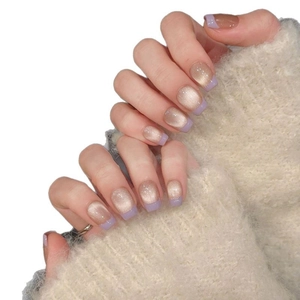 Cat-eye cat-eye press-on nails with golden-brown base and purple French tips design