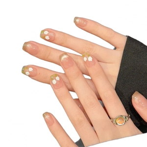 Cat eye press-on nails with 3D white tulip flowers and pink gradient glitter design