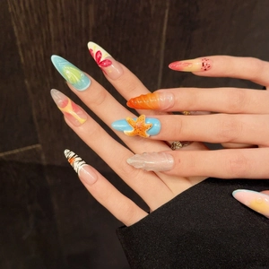 Tropical ocean style press-on nails with 3D starfish and shell embossed decorations