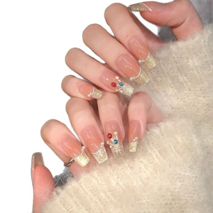 Long square press-on nails with gold glitter gradient, pearls, and colorful 3D balloon art
