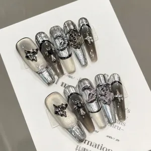 Silver cat-eye press-on nails with 3D metal gothic crosses and moon on long trapezoid shape