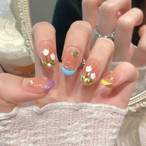 Handmade gradient cat eye press-on nails with 3D tulip patterns and French tips