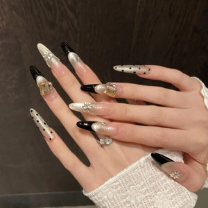Faux ongles faits main œil de chat noir français avec paillettes et strass brillants
