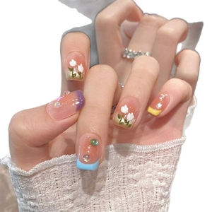 Handmade tulip press-on nails with colorful macaron gradient and rhinestone accents