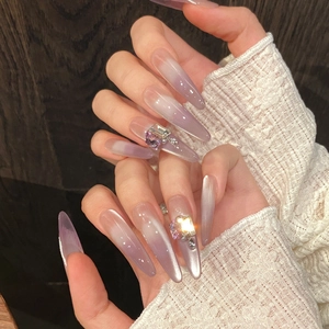 Taro purple gradient cat eye press-on nails with luxury rhinestones and stiletto shape