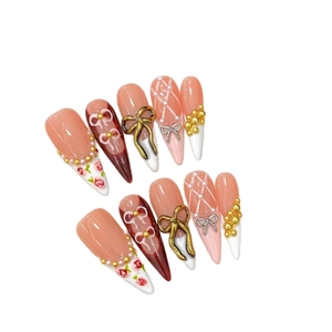 Handmade stiletto press-on nails with 3D bows and red tortoiseshell patterns in 10pcs set