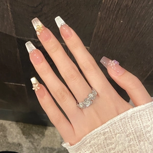 Floral silver open ring with 3D blossoms on model hand with matching flower gradient nails