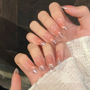 Pink gradient almond press-on nails with silver chrome French tips and cat eye finish