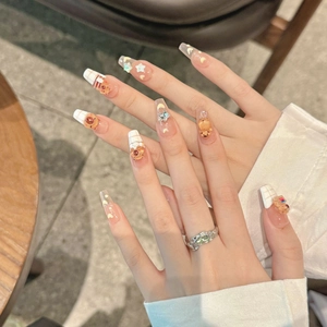 Handmade coffin press-on nails featuring 3D caramel bears and white plaid patterns