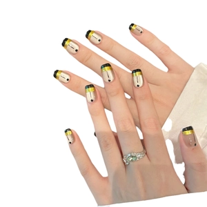 Minimalist metallic vaporwave press-on nails with gold accents and geometric line designs