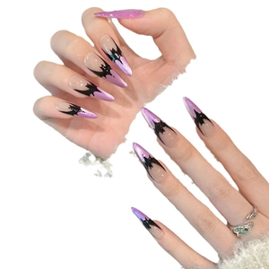 Gothic Halloween press-on nails with purple cat eye gradient and black bat wing design