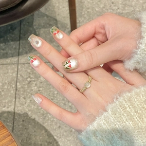 Handmade cat eye press-on nails with red tulip art and gold woven ring for women
