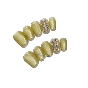 Unghie finte cat eye dorate con strass e finitura glitterata set da 10