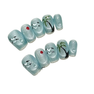 Handmade cat eye blue press-on nails with summer beach coconut tree and sunset art