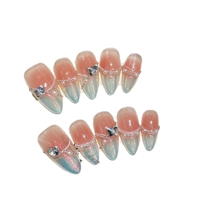 Pink and blue gradient cat-eye almond press-on nails with rhinestones and bows
