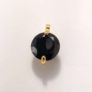 Round black multifaceted crystal pendant with gold plated metal claws and dual connection loops